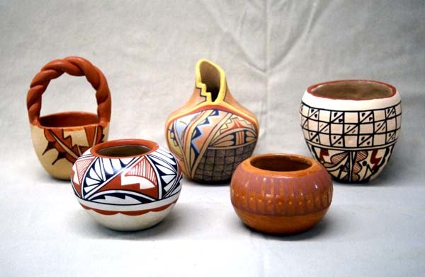 Collection of 5 Pieces New Mexico Pueblo Pottery: Collection of 5 Pieces New Mexico Pueblo Pottery, largest measures 4.75''H x 3.25''W, #1 Jemez Polychrome Jar signed R N Toya Jemez Pue. #2 Jemez Cutaway Rim Jar by Clara Gachupin Walatowa Jemez Pue. 