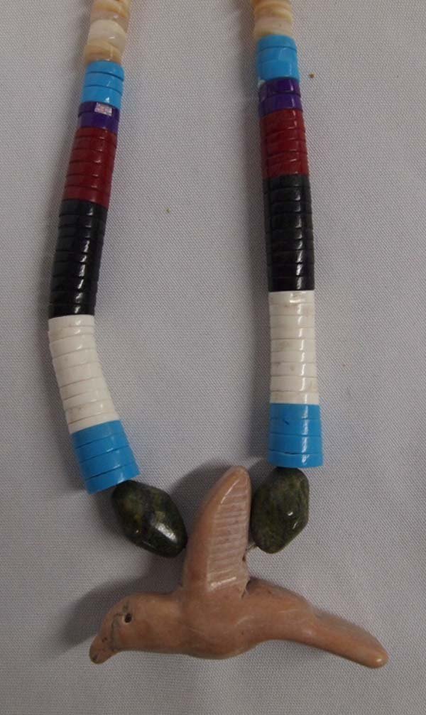 Santo Domingo Necklace: Santo Domingo Necklace, measures 20'' end to end and stone bird pendant measures 3''W x 2''H, features the following beads: agate, serpentine, pipestone, onyx, turquoise, and white marble