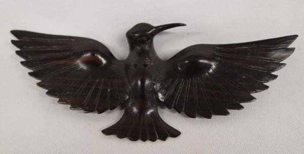 Carved Wooden Hummingbird: Carved Wooden Hummingbird. Piece shows a hummingbird with wings spread open and measures approx. 2.5'' x 6''.