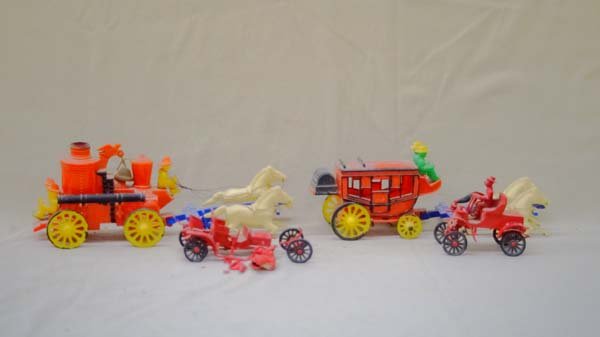 1950s Hard Plastic Cowboy and Fire Truck Toys: 1950s Hard Plastic Cowboy and Fire Truck Toys, longest measures 10''L x 3.5''W x 3.5'', features 1 horse drawn fire wagon, 1 horse drawn stagecoach, 1 Model T, and 2 partial/broken remnants