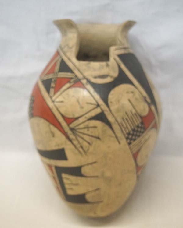 Mata Ortiz Polychrome Cutaway Rim Jar by J. Villa: Mata Ortiz Polychrome Cutaway Rim Jar by Jose Villa, measures 8''H x 5.5''W, features both abstract and geometric lines and designs