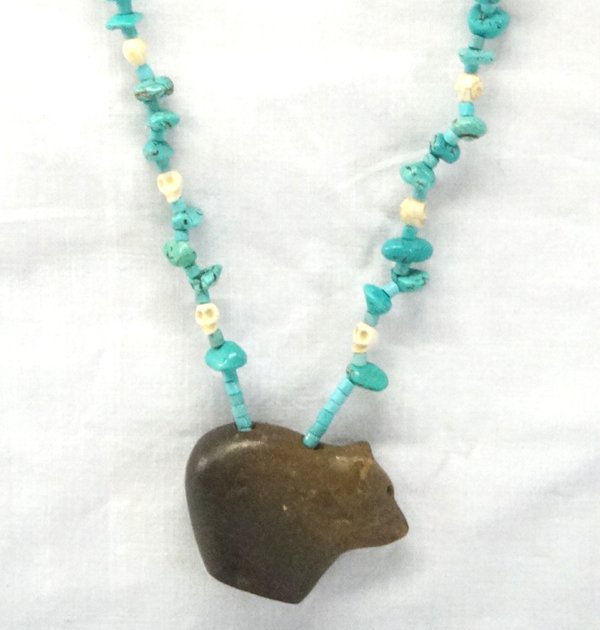 Micaceous Clay Bear Fetish Necklace, Kills Thunder: Micaceous Clay Bear Fetish Necklace, Kills Thunder, measures 23'' end to end x 2'', turquoise nuggets, turquoise beads, white skull beads, silvertone fish beads, silvertone spherical beads, signed mic