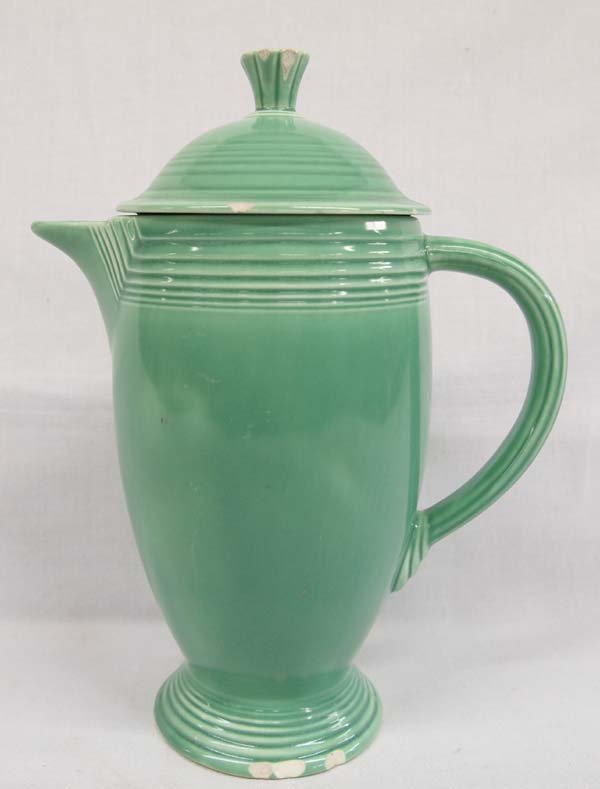 Vintage Medium Green Fiestaware Coffee Pot: Vintage Fiesta Medium Green Coffee Pot Fiestaware 1939-1956 Homer Laughlin, measures 10''H x 8.5''L x 4.5''W, 3 chips in lid, 4 chips in base, 4-5 chips in finial on lid, marked on bottom Fiesta HLC.