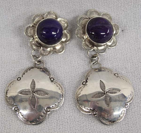 Navajo Sterling Sugilite Earrings by Jerry Cowboy: Navajo Sterling Sugilite Earrings by Jerry Cowboy, measure 2''L x 1''W, hallmarked C and stamped sterling, 12.08g in total wt.