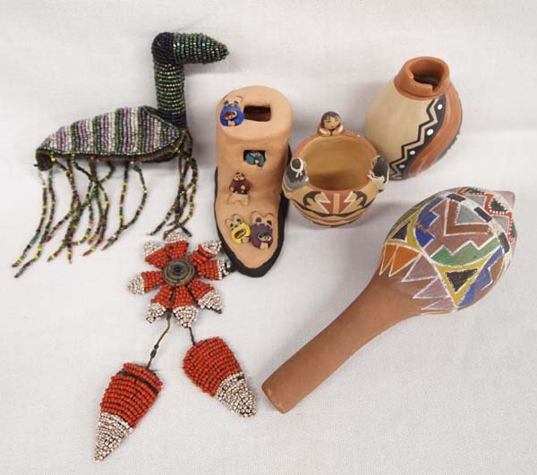 Collection of Pueblo Pottery and Beadwork: Collection of Pueblo Pottery and Beadwork, largest measures 7'' x 2.25'' x 2.25'', #1 Cochiti Pottery Storyteller Boot #2 Jemez Jar by F. Fragua #3 Jemez Friendship Pot signed A.L. #4 Jemez Pottery Ra