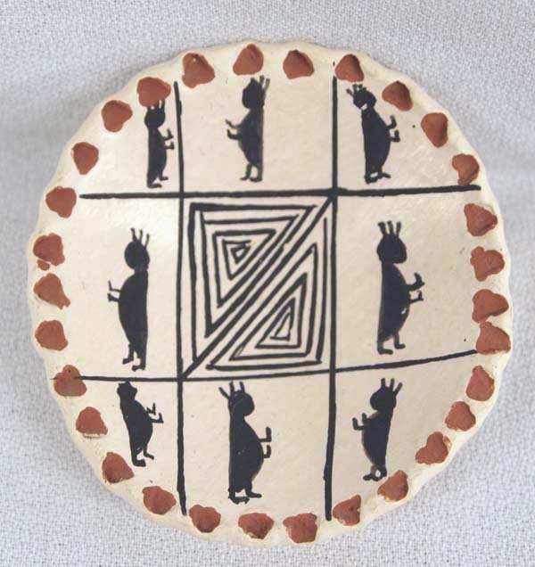 1980 Acoma Miniature Kokopelli Bowl: 1980 Acoma Miniature Kokopelli Bowl, measures 2.5''D x .5''H, bottom of bowl is signed Acoma, N Mex., center maze design surrounded by Kokopelli figures, carved rim