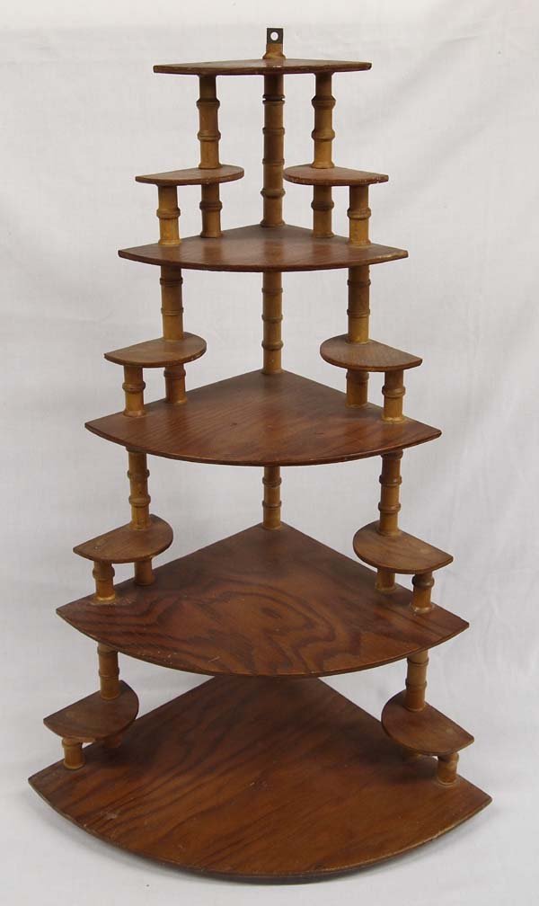 American Folk Art Spool Shelf: American Folk Art Spool Shelf, measures 30''H x 14'' x 19'', missing one of the bottom spools