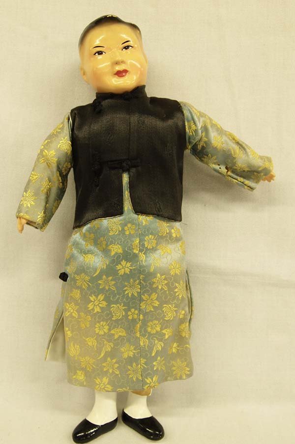 Antique Estate Chinese Doll: Antique Estate Chinese Doll. This gentleman doll has a cloth body and composition head, hands, & feet. The head has fixed painted lips, eyes, and hair. Dressed in a silk kimono with vest and pants. Th