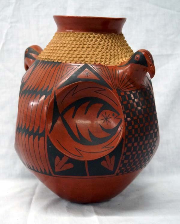 Mata Ortiz Polychrome Effigy Jar by Jose Gonzalez: Mata Ortiz Polychrome Effigy Pottery Jar by Jose Gonzalez, measures 10''H x 13''W, textured rim, signed on bottom by artist