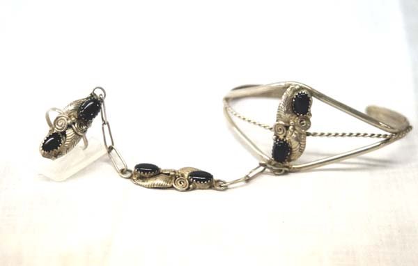 Navajo Sterling Silver Onyx Slave Bracelet: Navajo Sterling Silver Onyx Slave Bracelet, inside measures 6'' which includes opening x 1.25''W, chain measures 3.5''L, ring is size 6.5, 16g in total wt.