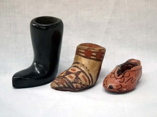 3 Vintage Native American Pueblo Pottery Boots: 3 Vintage Native American Pueblo Pottery Boots, largest is the Santa Clara measuring 2.5''H x 2.25''L x 1''D, small Vintage Maricopa Pottery Shoe, small chip, and Vintage Santa Clara Pottery Boot, pai