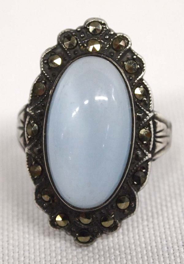 Estate Silver Marcasite Moonstone Ring, Size 6: Estate Silver Marcasite Moonstone Ring, Size 6, measures 1''W, beautiful carved band, stamped sterling and made in U.S.A., 5.37g in total wt.