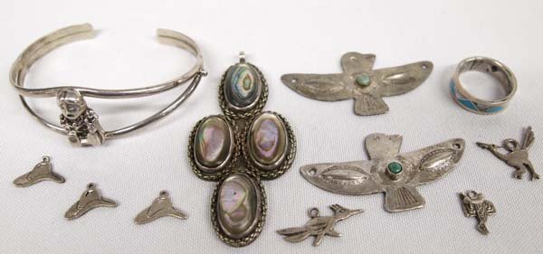 Collection of Navajo Sterling Silver Jewelry: Collection of Native American Navajo Sterling Silver Jewelry, #1 Antique Navajo Sterling Silver Abalone Pendant measures 3'' x 1.5'', #2 Navajo Sterling Turquoise Mother of Pearl Inlay Ring, size 7, #