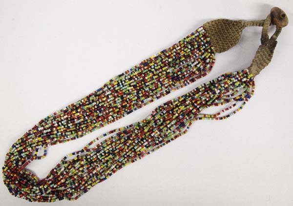 Vibrant Nepalese 24 Strand Glass Bead Necklace: Vibrant Nepalese 24 Strand Glass Bead Necklace, woven jute and button closure, measures 27'' end to end