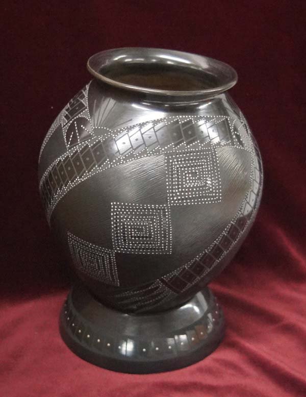 Mata Ortiz Sgraffito Geometric Jar, Efrain Lucero: Elegant Mata Ortiz Sgraffito Geometric Jar by Efrain Lucero, signed on bottom by artist, measures 7.75''H x 6.5''D, features maze and stylized feather designs, gorgeous sgraffito finish and comes with