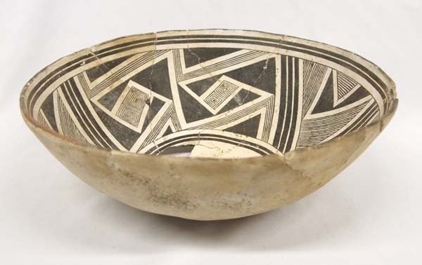 Prehistoric Mimbres Black on White Classic Bowl: Prehistoric Mimbres Black on White Classic Bowl, measures 11.5''D x 5.5''H, double maze pattern in four quadrants, two opposing bird wing quadrants, 1 piece missing in bottom, has not been cleaned, Ac