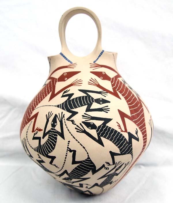 Mata Ortiz Polychrome Wedding Vase by Jose Villa: Mata Ortiz Polychrome Lizard Wedding Vase by Jose Villa, measures 8.5''H x 6''D, features lizards skittering all about this vase, signed on bottom by artist