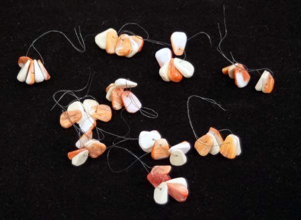 Navajo Red & White Shell Corn Beads: Navajo Red & White Shell Corn Beads. These sweet pieces are drilled and measure approx. .5'' long. Used in Jaclas.