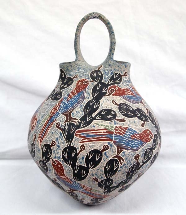 Mata Ortiz Sgraffito Parrot Wedding Vase by Villa: Mata Ortiz Sgraffito Polychrome Parrot Wedding Vase by Villa, measures 9''H x 6''D, features parrots eating prickly pear cacti, signed on bottom, blue spattered background