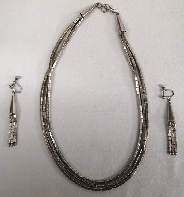 Santo Domingo Ed Aguilar Silver Necklace, Earrings: Outstanding Native American Santo Domingo Pueblo Ed Aguilar (1941-2006) Liquid Silver 3 Strand Necklace and Screw-back Earrings, beaded necklace is strung on chain and measures 16.5" end to end, each