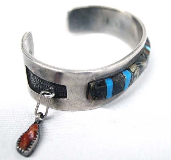 Zuni Old Pawn Sterling Silver Inlay Bracelet: Native American Zuni Old Pawn Sterling Silver Inlay Bracelet, hallmarked with mountain and sunrise/sunset picto hallmark, very unusual piece, tapered cuff (widest part almost 1''W) with stone to stone