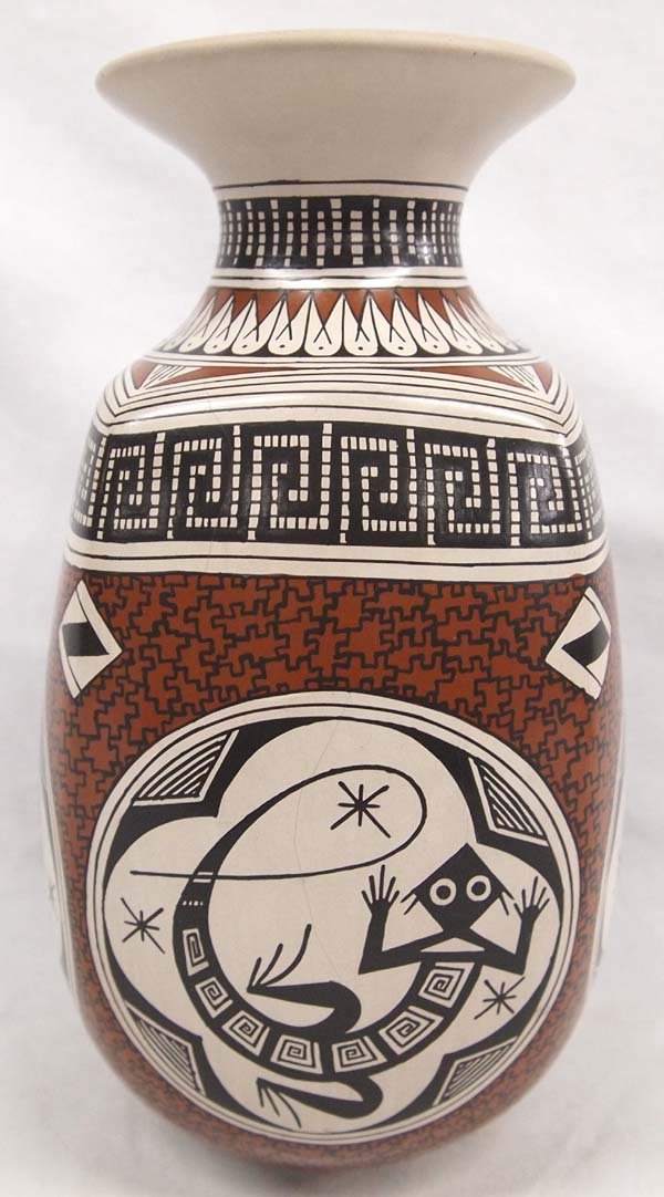 Mata Ortiz Polychrome EyeDazzler Jar by Martinez: Stunning Mata Ortiz Polychrome EyeDazzler Jar by Nancy Herasde Martinez, Greek Key Designs, Jigsaw Designs, 4 animal quadrants featuring Bird, 2 Lizards, and a Frog, measures 8.5''H x 5''D, some crazi