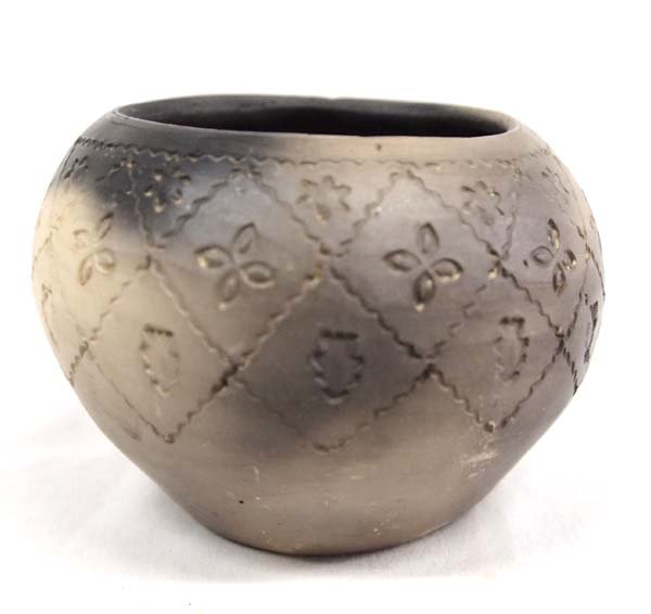 Cherokee Pottery Bowl by Jackson: Native American Cherokee Pottery Bowl by Jackson, stamped designs, bottom is signed ''Made by Jackson Cherokee'', measures 3'' x 4''