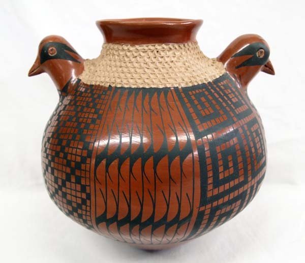 Mata Ortiz Bird Effigy Jar by Jose Gonzalez: Mata Ortiz Bird Effigy Jar by Jose Gonzalez, double headed, textured neck, eye dazzler and stylized feather designs, signed on bottom by artist, measures 9''H x 9.5''W