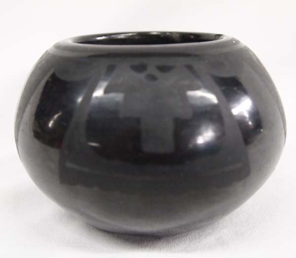 San Ildefonso Black on Black Jar by R.& J. Aguilar: Native American San Ildefonso Black on Black Jar by Rosalie & Joe Aguilar, measures 3'' x 4'', signed on bottom by artists ''Rosalie + Joe LATTA'', Bio Info: Rosalie and Joe were some of the first fam