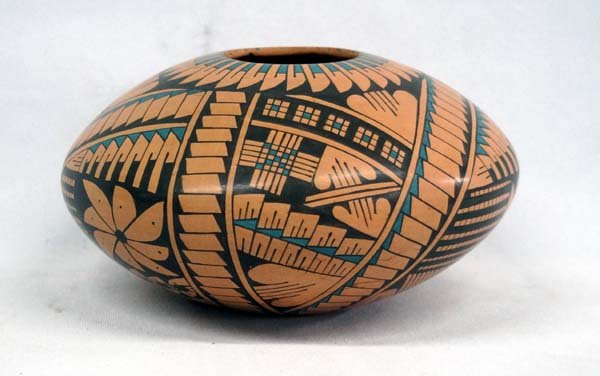 Mata Ortiz Polychrome Stylized Feather Jar, Corona: Mata Ortiz Polychrome Stylized Feather Jar by Sara Corona, measures 4''H x 7''D, hallmarked and signed on bottom by artist