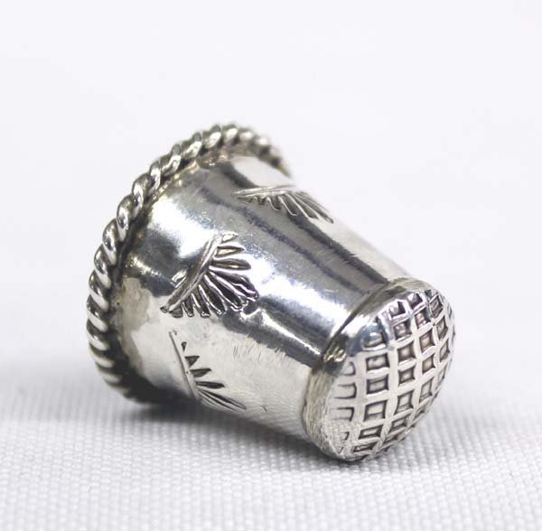 Navajo Sterling Silver Thimble: Native American Navajo Sterling Silver Thimble, measures .75''H x .75''W, stampwork embellishments, stamped sterling, 3.5g in total wt.