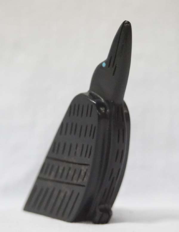 Zuni Hand Carved Jet Raven Fetish by Amos Pooacha: Native American Zuni Indian Hand Carved Raven Fetish from the Zuni Pueblo in Western New Mexico. This fetish is beautifully carved into a piece of black Jet. The Raven features Turquoise inlay eyes an