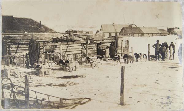 Antique Alaskan Iditarod Photograph: Antique Iditarod Photograph, measures 3'' x 5.5''L, written on back reads ''See Me? With my hands to my hips, just before we started back to St. Michael 70 miles over the Sea.''
