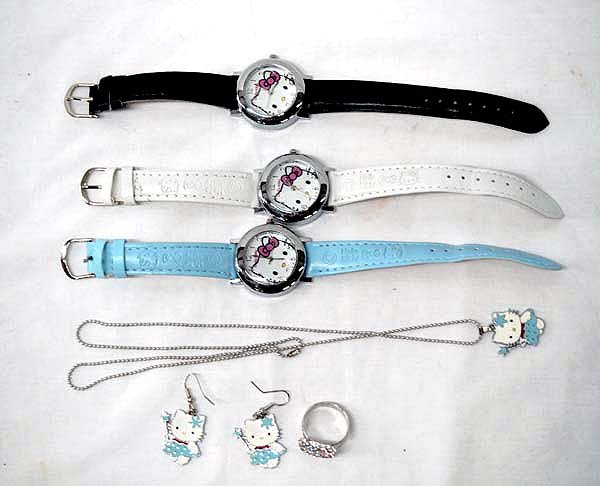 Collection of Hello Kitty Jewelry: Collection of Hello Kitty Jewelry, includes 3 watches, necklace which measures 23'' end to end and pendant measuring 1'' x .75'', earrings measuring 1.5''H x .75''W, and adjustable ring