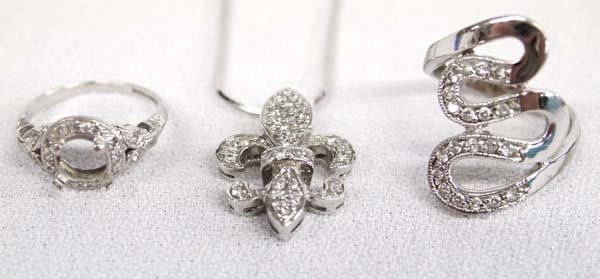 Diamond Fleur de Lis Pendant Necklace and Rings (1 of 5)