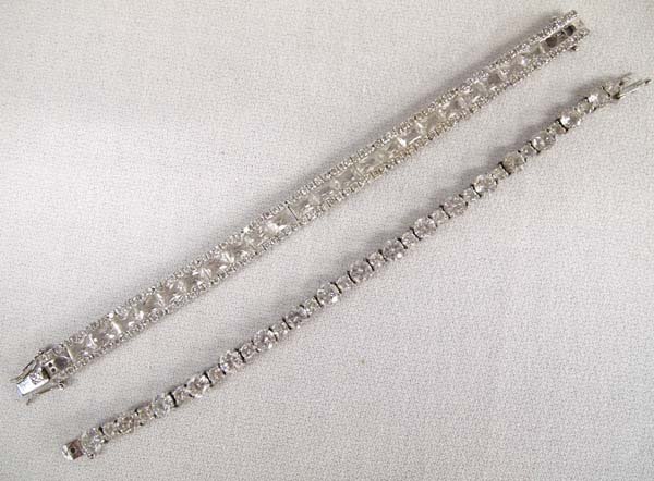 2 Estate Sterling Silver and CZ Bracelets: From the Posey Estate, we have 2 Elegant Sterling Silver and CZ Bracelets, longest measures 7''L x .25''W, both are stamped .925, 44.9g in total wt.