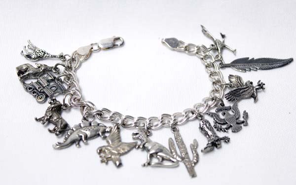 Sterling Silver Charm Bracelet 38.2 grams (1 of 2)