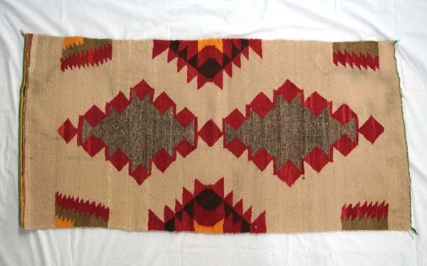 Antique Navajo Textile Rug: Antique Native American Navajo Textile Rug, measures 22'' x 42'', some staining