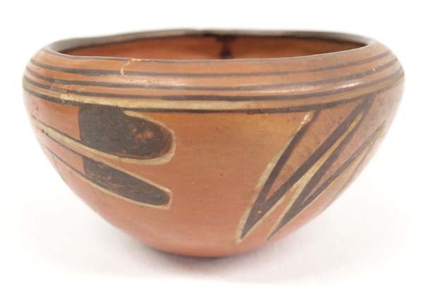 1950 Native American Hopi Pottery Bowl: 1950 Native American Hopi Polychrome Pottery Turkey Tail Bowl, measures 3.5''H x 6''D, small nip in rim