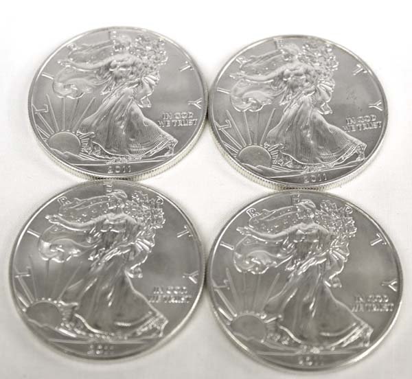 Four 2011 Uncirculated Silver Eagle Dollar Coins (1 of 2)