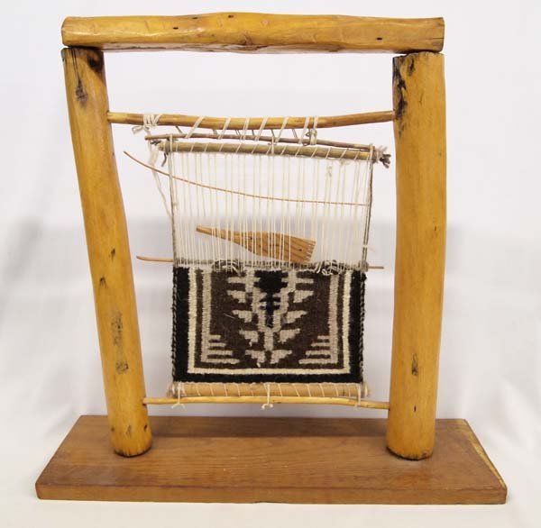 Navajo Two Gray Hills Rug on Weaver's Loom: Miniature Native American Navajo Two Gray Hills Rug on Weaver's Loom with Comb, measures 18.75''W x 8.5''H x 5.75''W