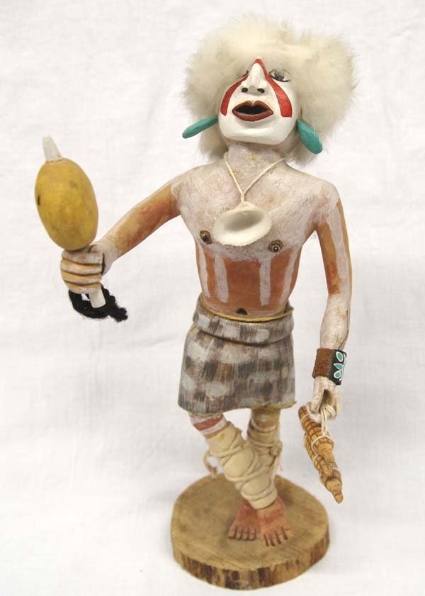 Native American Hopi Kachina by Cimmaron Grover: From the Whittredge Estate, we have a Native American Hopi ''Crosslegged'' Kachina by Cimmaron Grover, signed by artist, measures 11''H x 4.25''W, embellished with rabbit fur, yarn, and seashell, FYI: