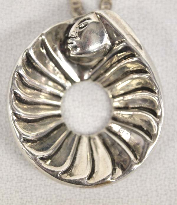 Chippewa Silver Pendant Necklace, Bruce LaFountain: Native American Chippewa, French and Cree Sterling Silver Pendant Necklace by Bruce LaFountain, sterling chain measures 18'' end to end and pendant measures 1.5'' x 1.25'', signed by artist, FYI: ''Ra