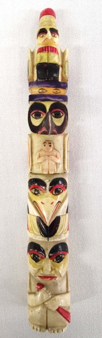 Vintage Carved Bone Totem Pole: Vintage Carved Bone Totem Pole, measures 8''H x 1.25''W x 1.25''Deep