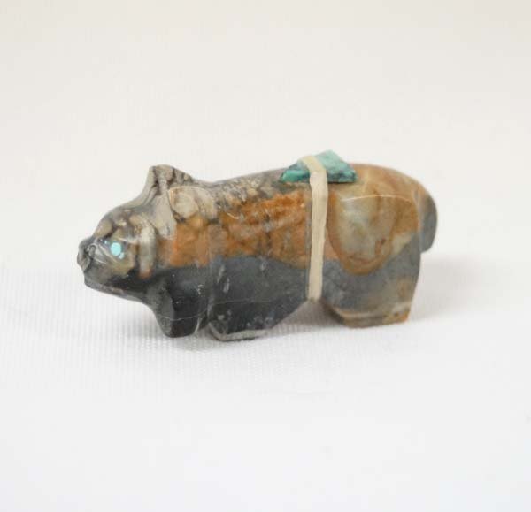 Zuni Carved Bobcat Fetish: Native American Zuni Carved Bobcat Fetish, turquoise eyes, measures 1.5''L x .5''W, abalone arrowhead spirit bundle