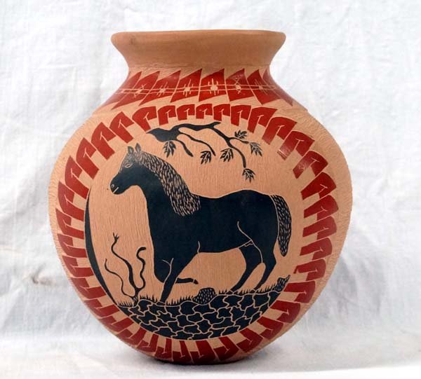 Mexican Mata Ortiz Sgraffito Horse Jar by David B.: Mexican Mata Ortiz Sgraffito Horse Jar by David B., signed by artist and measures 7''H x 6.25D, features stylized feather designs and horsesm, flared rim, truly a work of art
