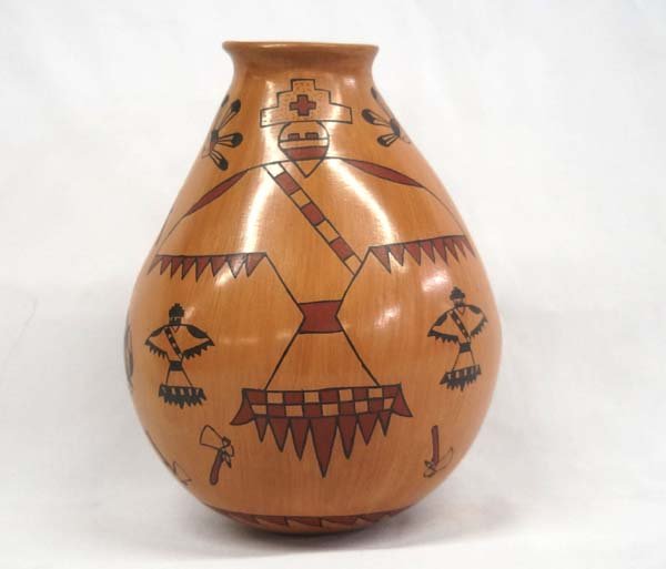 Mexican Mata Ortiz Polychrome Jar by Daniela G. H.: Mexican Mata Ortiz Polychrome Jar by Daniela G. H., measures 9''H x 7''D, signed by artist, pulled spout and flared rim, features Native American lines and designs