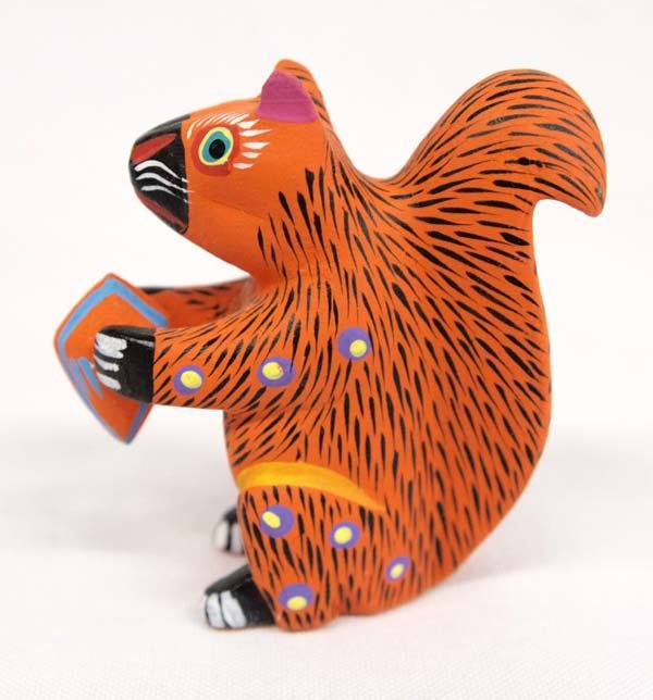 Mexican Oaxacan Alebrije Squirrel by Olivia Ruiz: Mexican Oaxacan Alebrije Squirrel by Olivia Ruiz, measures 2.5'' x 3'', signed by artist and vibrantly painted