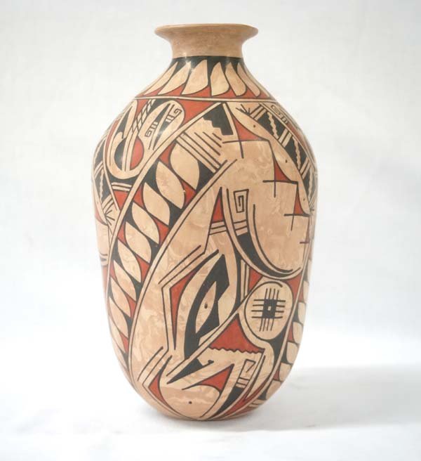 Mexican Mata Ortiz Polychrome Jar by A. Soto: Mexican Mata Ortiz Polychrome Jar by Alejandra Soto, measures 11'' x 6.5''D, signed by artist, features Paquime' inspired lines and designs