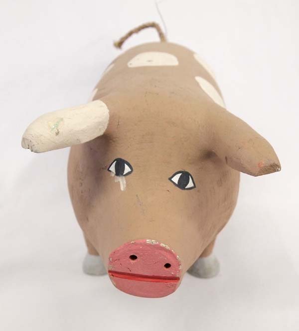 1987 Native American Navajo Folk Art Wood Pig: 1987 Native American Navajo Folk Art Wood Pig by Hector Rascon, measures 6'' x 7'' x 15'', signed by artist, FYI: ''Hector's carved saints, angels and painted animals have become familiar in Santa Fe.